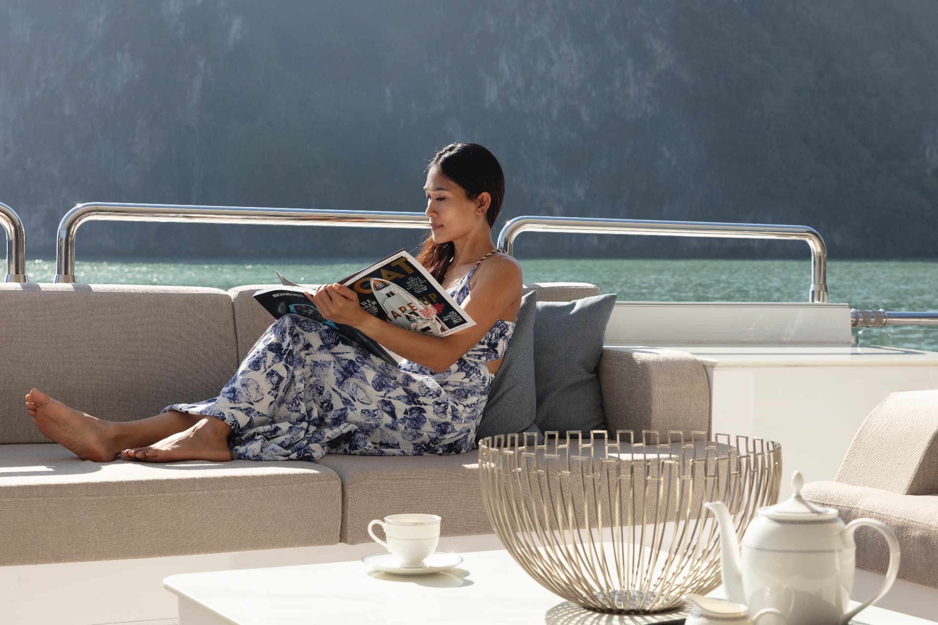 Main deck lounge aboard the Astondoa 150 charter yacht in the Andaman Sea